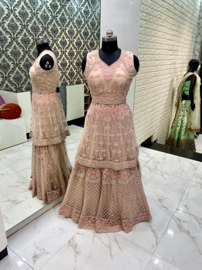 Peach Net Embroidered Peplum Lehenga